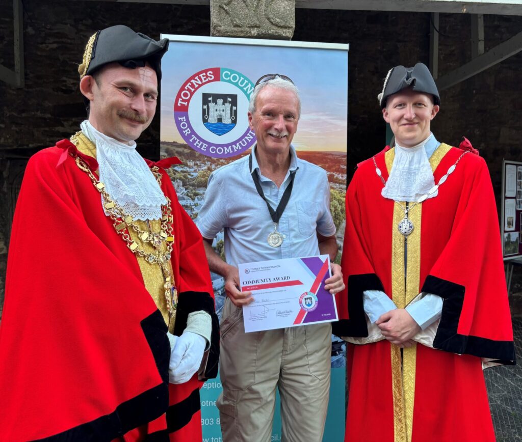 Alan Blake from Totnes and Dartington Football Club with his award